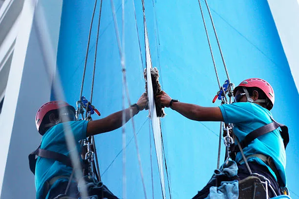 a man window cleaning